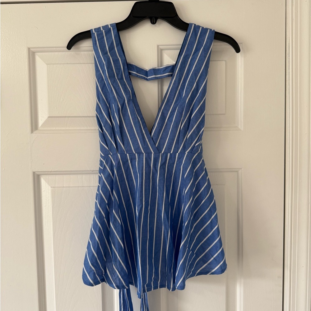 Blue and white striped peplum top